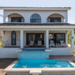 Rosada Seascape home in Rancho Santana with a private pool and colonial facade