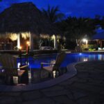 The community pool glowing at dusk