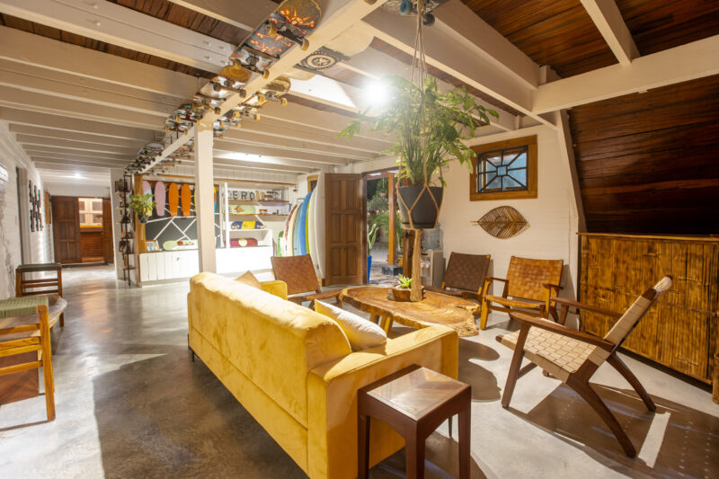 Covered patio lounge with a wood ceiling