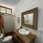 Bathroom with a framed mirror