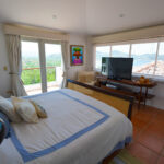Bedroom with ocean view and private terrace