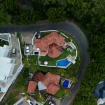 Bay-view home in Pacific Marlin — overhead of the villa and neighboring lots