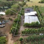 Aerial marking the 8,759 m² property boundary