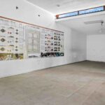 Hardware store display wall with storage