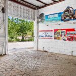 Covered commercial area with signage