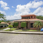 The Prado Hills home seen from the paved neighborhood street