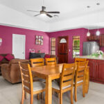 Living and dining area with the granite island kitchen