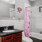 Bathroom with a vanity and bathtub