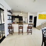 4-bedroom villa with pool in Colinas de Miramar — kitchen bar and stairway