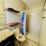 Bathroom with tiled walk-in shower