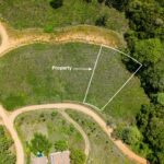 Overhead view with the lot boundary and access road