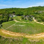 Panoramic ocean view lot near TreeCasa — lot boundary marked on the hillside