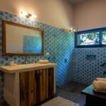 House on land in Big Sky Ranch — bathroom vanity with patterned tile