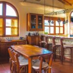 Ocean view home in Pelican Eyes — dining table beside the kitchen