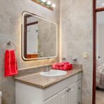 En-suite bathroom with vanity and shower