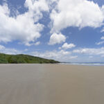 Panoramic view of Playa Yankee beach and headland