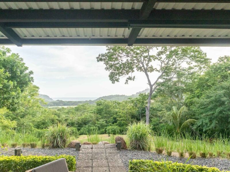 View over San Juan Bay and green farmland from the patio