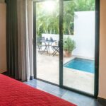 Bedroom with sliding glass door to the plunge pool