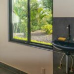 Bathroom with vessel sink and garden window