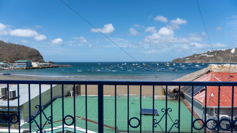 Oceanfront condo at Casa Marina — balcony view over San Juan del Sur Bay
