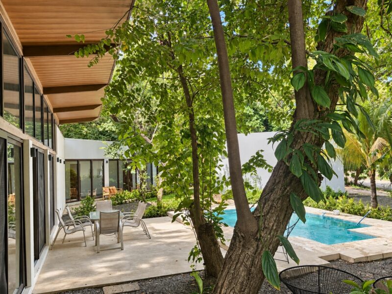 Covered terrace overlooking the pool at Hacienda Iguana home for sale