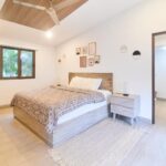 Second bedroom with ensuite access at Hacienda Iguana pool home