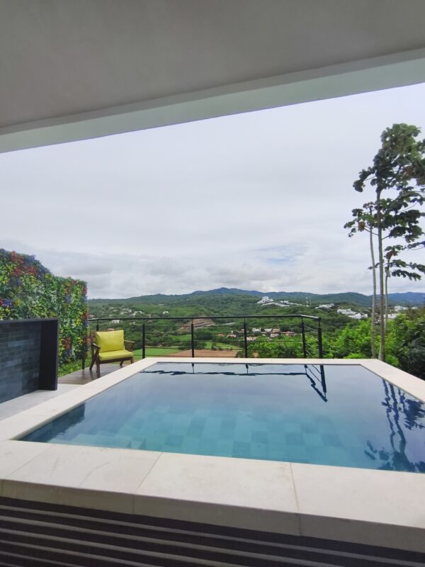 Townhouse with pool in Pacific Marlin — private pool overlooking the green hills