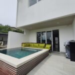 Townhouse with pool in Pacific Marlin — pool and patio off the living area