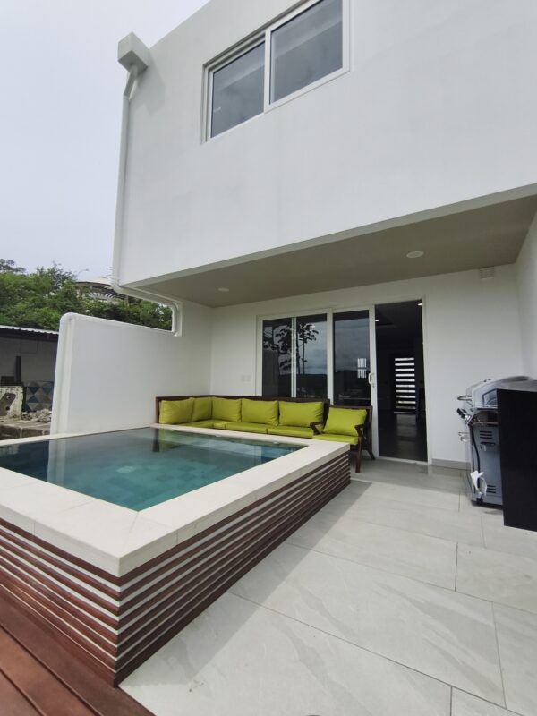 Townhouse with pool in Pacific Marlin — pool and patio off the living area