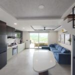 Townhouse with pool in Pacific Marlin — open kitchen and living area